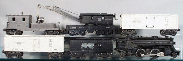 LIONEL TRAIN SET: O ga, 1654 loco, 1654W tender, front of tender dented out of shape, large paint disturbance on 1 side, 6472 reefer, w/rough orig box, 3462 operating milk car, 2460 crane, 2420 seachlight work caboose,