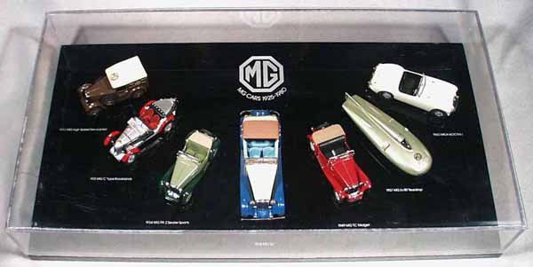 CLASSIC MODEL REPLICAS MG DISPLAY: 7 different die cast models, in plexiglass case, case measures 17 1/4 by 9 1/4 in, C9.