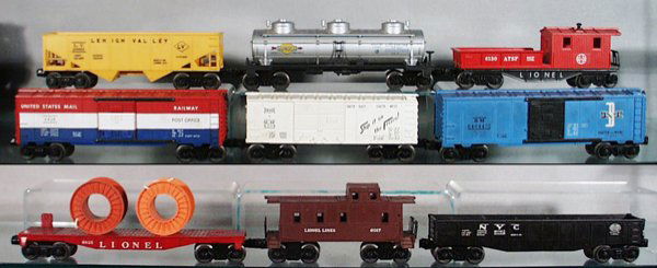 9 LIONEL FREIGHT CARS: O ga, 6176 LV hopper, 6415 Sunoco tank car, 6130 SF caboose, 6428 Post Office box car, 6014 Frisco box car, 6464-475 B&M box car, dirty, 6825 flat car w/2 cable reels, no holddowns, 6017 caboose, 6062