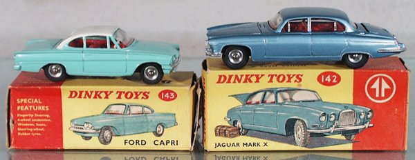 2 DINKY AUTOS: 143 Ford Capri, box rub on roof; 142 Jaguar Mark X, scratch on roof & hood, orig boxes, 1 box worn & missing tuck flap, C5-6.