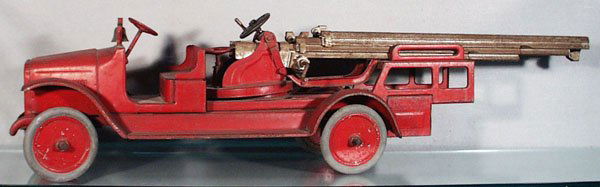 BUDDY L 205 AERIAL LADDER TRUCK: painted pressed steel, old repaint, oxidation on ladders, 39 in long, C3.