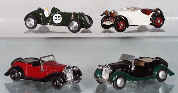4 MG AUTOS: white metal, Bro Models R-Type Racer; Grand Prix Models 1933 J2 Midget; 2 DG Models 1937 MG's, orig boxes minor wear, C7-9.