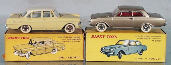 2 FRENCH DINKY AUTOS: 554 Opel Rekord, flat finish, orig box minor wear, C6-7; 559 Ford Taunus, orig box, C8-9.