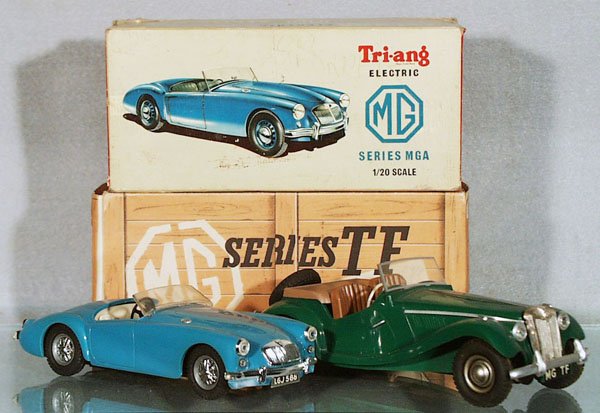 TRIANG & VIP MG AUTOS: Triang MGA, blue, 8 in long; VIP MGTF, green, 8 1/2 in long, missing radiator cap, both are battery operated, not tested, orig boxes have wear, C7-8.
