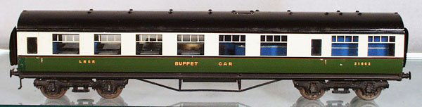 BASSETT-LOWKE LNER BUFFET CAR: O ga, litho tin, w/full interior, the roof is an old repaint, 16 in long, C5.