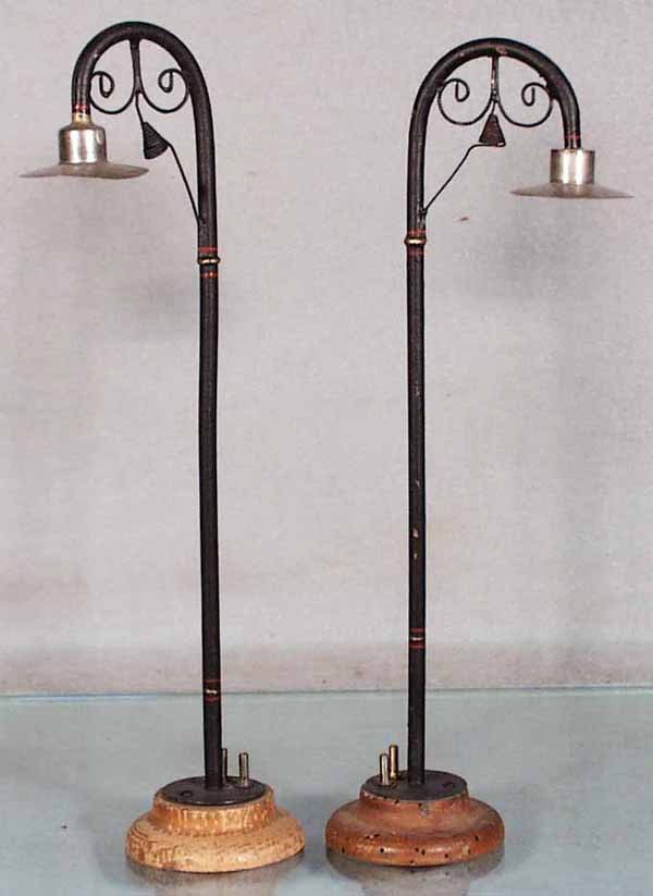 2 MARKLIN LAMP POSTS: handpainted tin, wooden bases, 1 base worn, 11 1/2 in tall, C6-7.