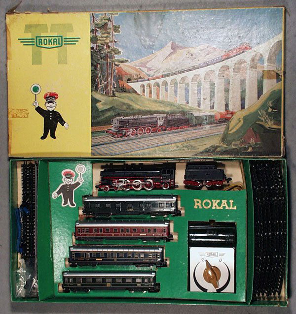 ROKAL 1114 AUSTRIA EXPRESS TRAIN SET: made in Germany, TT ga, German loco & tender w/4 passenger cars, w/track, transformer & catalogs, orig box & inserts minor wear, C7-8.
