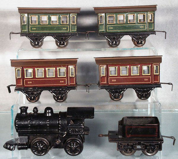 2 GERMAN TRAIN SETS: O ga, Bing train set, loco, painted cast iron, clockwork working, tender, 4 #210 coaches, 1 has a small oxidation spot on roof; KBN train set, litho tin, loco, clockwork working, tender, 2 coaches, C5