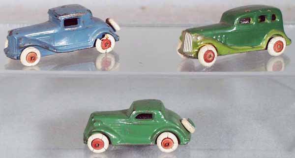 3 BARCLAY AUTOS: slush die cast, blue Coupe w/spare, 3 1/4 in long, green Sedan, old repaint, 3 in long, green Coupe w/spare, 2 3/4 in long, all tires worn & some incom, 2 tires missing, C4-5.