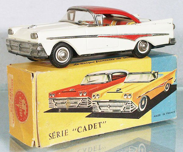 JOUSTRA 1958 FORD: litho tin, friction working, white & red w/black rubber tires, 7 3/4 in long, some playwear & scratches, orig box some wear, C6-7.