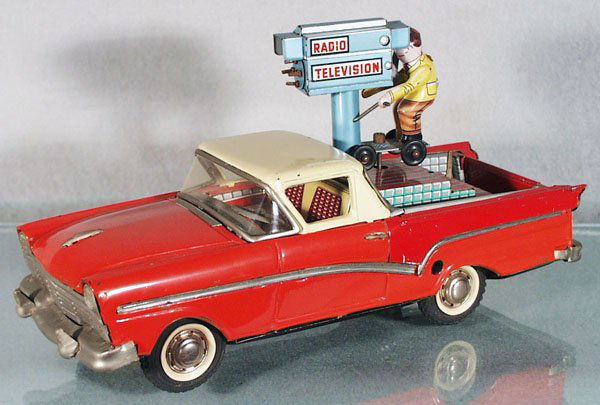 JOUSTRA 1957 FORD TELEVISION CAMERA TRUCK: litho tin, windup not working, black rubber tires, 11 3/4 in long, some playwear & chips, C4-5.