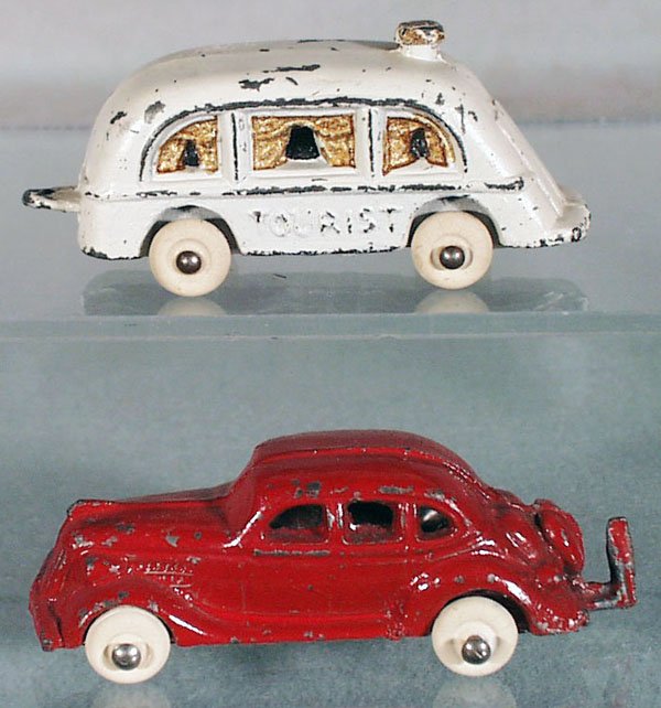 TOMMY TOY AUTO & TRAILER: slush die cast, red, white & gold, 6 3/4 in long, C5.