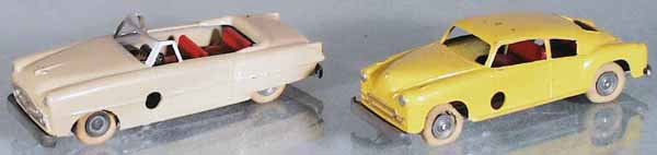 2 SOLIDO VEHICLES: 114 Packard, cream, windup working, driver's side rear fender has the beginnings of alligatoring & fatigue, 83 Chevrolet, yellow, non-windup version, tires flat & warped, some paint chipping on roof,