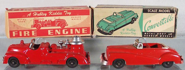 2 HUBLEY KIDDIE TOY VEHICLES: 464 Fire Engine, paint chips on 1 side, 7 1/2 in long; 458 Convertible, 7 in long, orig boxes worn, C7-8.