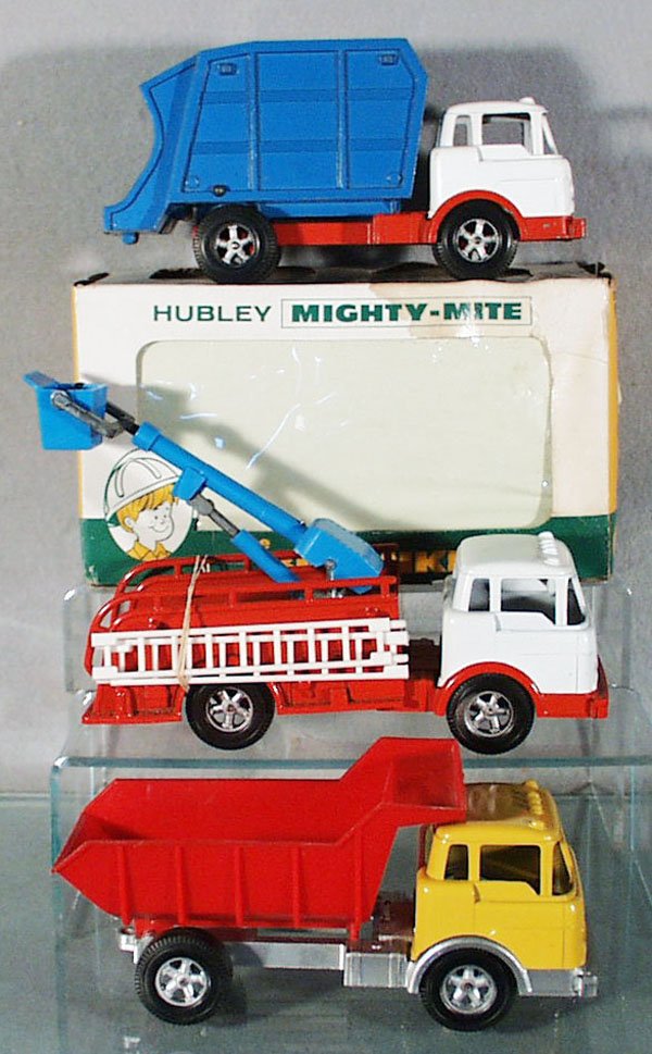 3 HUBLEY FORD MIGHTY MITE TRUCKS: painted die cast & plastic, 1493 Dump Truck, orig box minor wear, 1493 Cherrypicker, 1490 Dump Truck, all are 8 in long, C7-9.