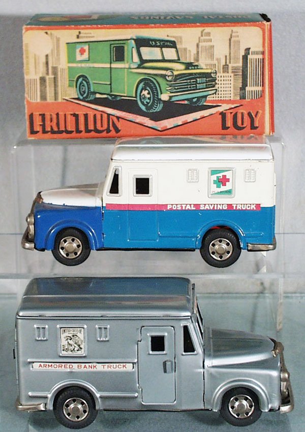 2 SSS OF JAPAN DODGE TRUCKS: litho tin, friction working, Postal Savings Truck, orig box worn & incom, US Armored Bank Trust Truck, both are 7 in long, w/black rubber tires, both have coin slots, C7-8.