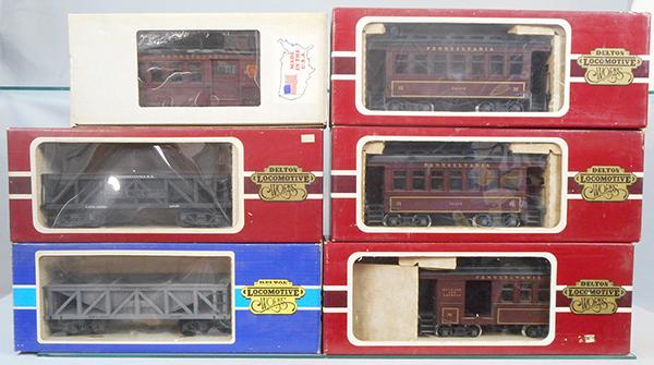 6 DELTON PENNSYLVANIA CARS: G ga, 4274 PA caboose, 3211 combine, 2 #3210 coaches, 4253 LV hopper, 4253 PA hopper, orig boxes & inserts minor wear, C7-8.