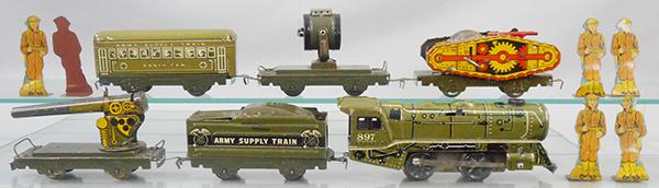 MARX ARMY TRAIN SET: O ga, 897 loco, litho tin, windup working, 952 tender, AA gun flat, flat w/tank, windup working, searchlight car, radio car, 6 soldiers & track, w/orig Army Depot box, worn, roof flaps loose, C7.