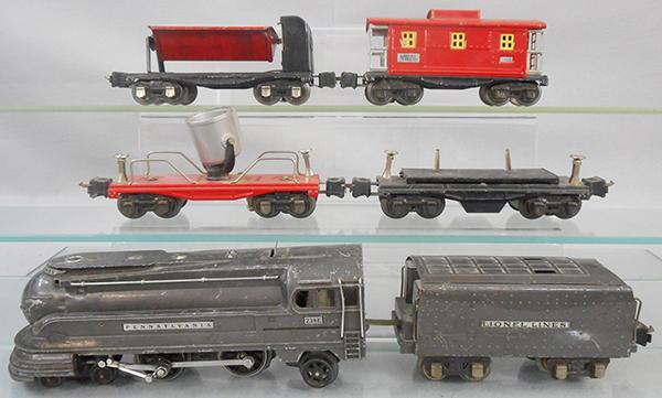 LIONEL TRAIN SET: O ga, 238E loco, some playwear scratches, 265W tender, 2620 searchlight, missing glass, 3651 lumber car, missing 2 stakes, 3659 dump car, 2657 caboose, C5-6.