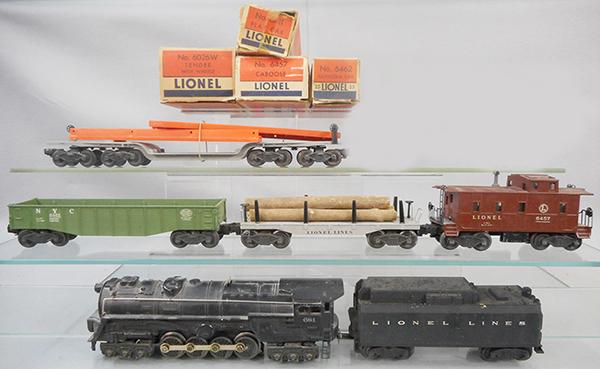 LIONEL TRAIN SET: O ga, 681 turbine loco, layout paint drip on cowcatcher, 6026W tender, 6462 gondola, 6411 lumber, 6418 machinery car, 6457 caboose, orig boxes worn & incom, C6-7.