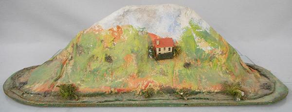 LIONEL 918 MOUNTAIN: std ga, papier mache on wood base, 30 x 9 1/2 in oval wood base, needs cleaning, C6-7.