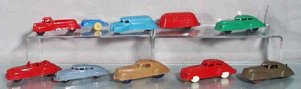 10 PLASTIC VEHICLES: manufacturers include Thomas, Hawk Model Co, Keystone, Premier & Acme, from 2 1/2" long to 4 1/2" long, the green Police car has a chipped decal, 2 vehicles are incom, C6-9.