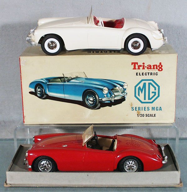 TRIANG & ARNOLD MGA AUTOS: Arnold MGA, white, friction working, 8" long, 2 body cracks; Triang MGA, red, battery operated, not tested, 7 3/4" long, orig box minor wear, C6-9.
