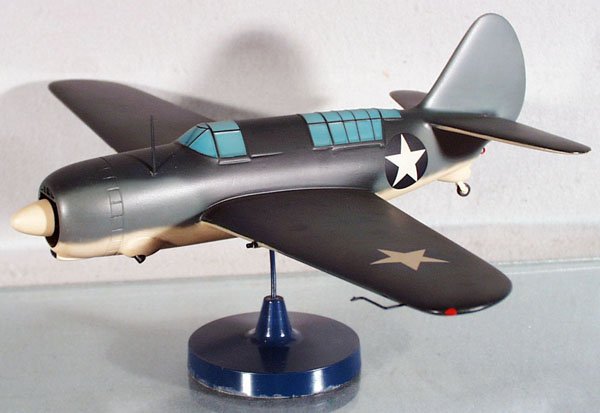 US FIGHTER PLANE: handpainted hardwood, made from Cleveland Model plans from the 40's to 60's, 18 1/2" wingspan, mounted on display stand, C9.