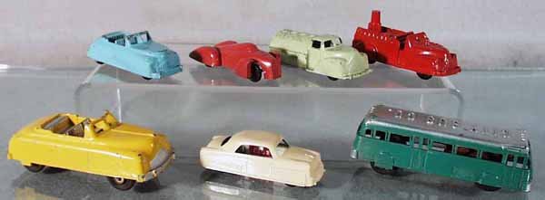 7 RENWAL VEHICLES: die cast, 5 3" vehicles, the Gas Truck is missing 1 set of wheels, Cadillac, friction working, 4" long, Bus, friction not working, 4 1/2" long, C5-6.