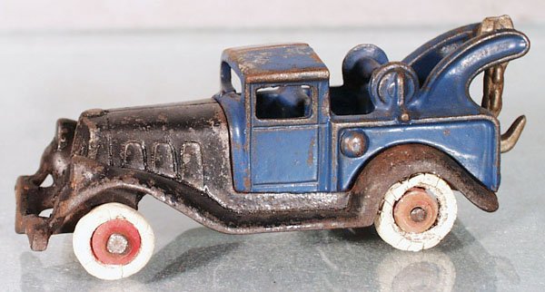 HUBLEY WRECKER: painted cast iron, blue & black, rubber tires worn, 4 1/2" long, C4-5.