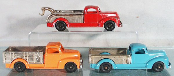 3 HUBLEY FORD TRUCKS: die cast, cast iron trim, 462 Wrecker, red, 452 Stake Truck, orange, 461 Pick Up, blue, all are 7" long, C5-7.