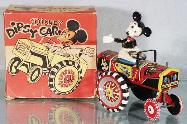 MARX MICKEY MOUSE DIPSY CAR: litho tin, windup working, 5 1/2" long, plastic Mickey Mouse figure has repaired arm, small chip missing, orig box minor wear, C6-7.