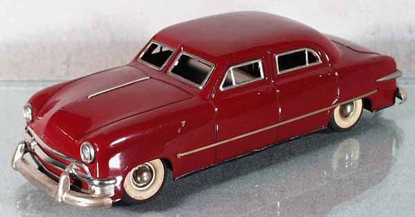 GUNTHERMANN 1949 FORD SEDAN: US Zone Germany, litho tin, windup working, black rubber tires, battery headlights, untested, battery box clean, 11" long, missing hood ornament, C8.