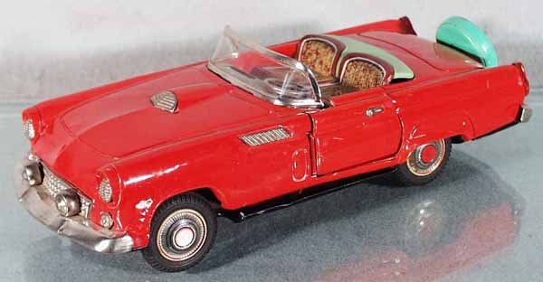 TN 1956 FORD THUNDERBIRD CONVERTIBLE: litho tin, battery operated, untested, battery box has wear & damage, black rubber tires, 11" long, missing dashboard directional control rod, some playwear, C5.
