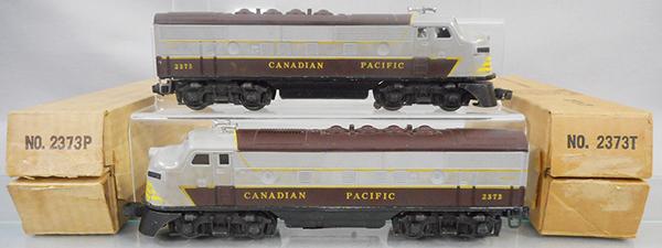 LIONEL 2373 CANADIAN PACIFIC DIESELS: O ga, 2373P twin motors, minor nose decal wear over louver, other side has bubbling, 2373T, orig boxes minor wear, C7-8.