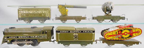 MARX ARMY TRAIN: O ga, litho tin, 500 Army electric loco & tender, flat w/tank, windup working, searchlight, AA gun, radio car w/antenna, w/track & transformer, orig set box bottom only, C5-7.