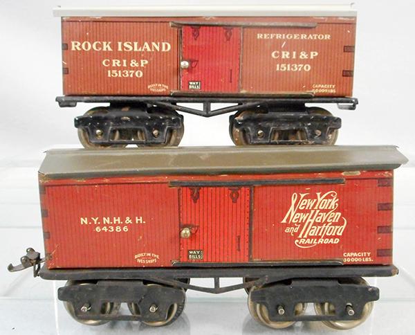 IVES BOX CARS: O ga, litho tin, 64 Rock Island, faded, 64 NY NH & H RR, both have restored roofs, ca 1920s, C7.