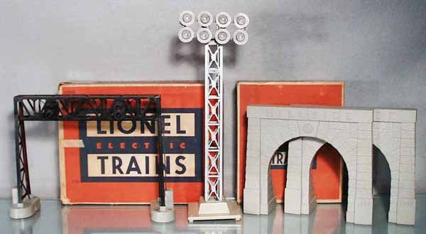 3 LIONEL ACCESSORIES: O ga, 450 signal bridge, 195 railroad yard floodlight, 920-2 tunnel portals, orig boxes worn & taped, C6-8.