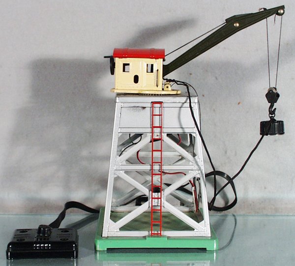 LIONEL 165 MAGNETIC CRANE: O ga, silver superstructure, needs restringing, controller missing 4 buttons, C5-6.