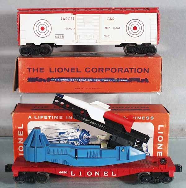 2 LIONEL FREIGHT CARS: O ga, 6448 exploding target car, white sides yellowing, 6650 missile launching flat car, orig boxes worn, C7-8.