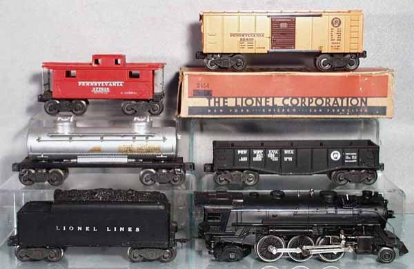 LIONEL 1405 TRAIN SET: O ga, 1666 loco, w/silver "X" on left firebox door in cab, 2466T tender, 2465 Sunoco tank, 1 decal missing, other decals yellowed, 2454 PR box car, orig box worn, 2452X gondola, 2472 caboose, all have