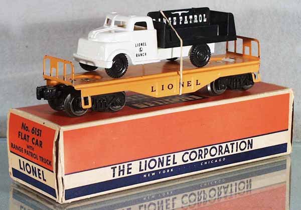LIONEL 6151 FLAT W/RANGE PATROL TRUCK: O ga, all steps have paint chips, orig box minor wear, C7-8.
