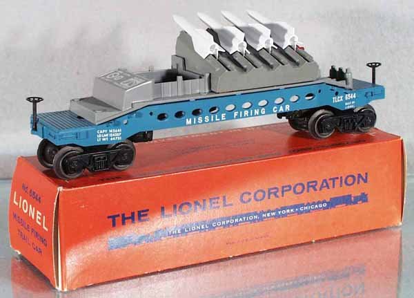 LIONEL 6544 MISSILE FIRING CAR: O ga, white console, both brakewheels intact, orig box minor wear, C8.