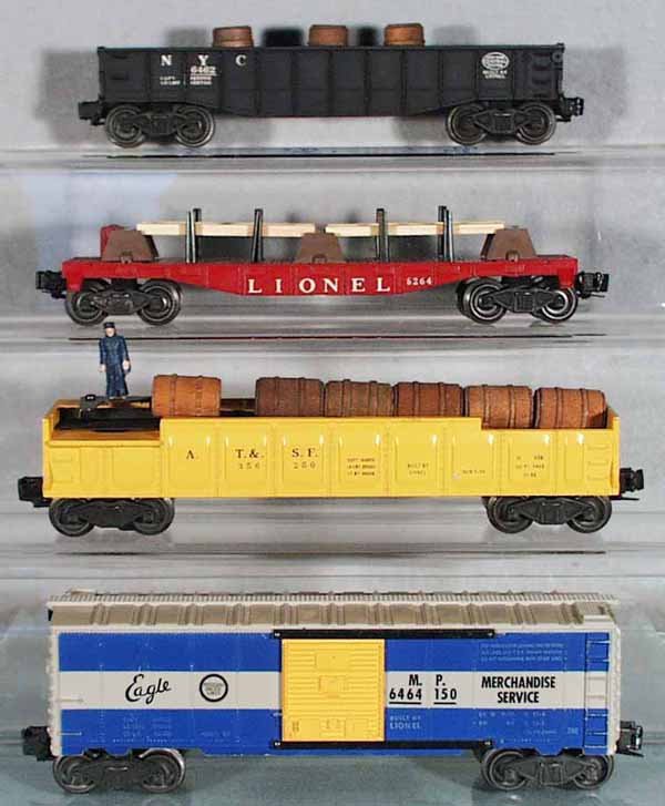 4 LIONEL FREIGHT CARS: O ga, 6462 NYC gondola w/barrels, 6264 lumber car, 3562-50 barrel car, 6464-150 MP Eagle box car, steps chipped, C4-5.