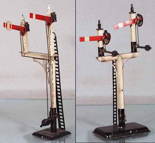 MARKLIN & BING DOUBLE SEMAPHORES: Marklin 2819/0 double semaphore, handpainted tin, 8 3/4" tall, oxidation spots on white uprights, some paint chipping, C5; Bing 10/6121/2 double semaphore, handpainted tin, manual, 9 1/4" tall, some p