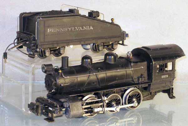 LIONEL 227 SEMISCALE LOCO & TENDER: O ga, 227 switcher, small bend to corner of cab roof, 2227B tender, missing both coupler pins, C5-6.