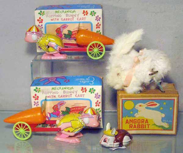 4 RABBIT TOYS: litho tin, plastic & plush, all are windups working, 2 Bunny Carts, Angora Rabbit, Hopper, 3 orig boxes only, C6-8.
