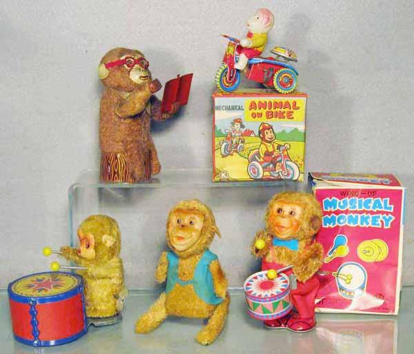5 JAPANESE ANIMAL TOYS: litho tin, plastic & plush, Reading Monkey, Monkey Tricycle, orig box, Drumming Monkey, Jumping Monkey, Musical Monkey, orig box, all are windup working, C5-9.