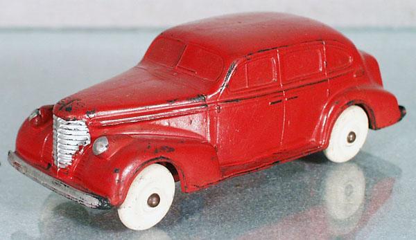 AUBURN RUBBER 1938 OLDSMOBILE SIX: 5 1/2" long, white rubber tires, C5.