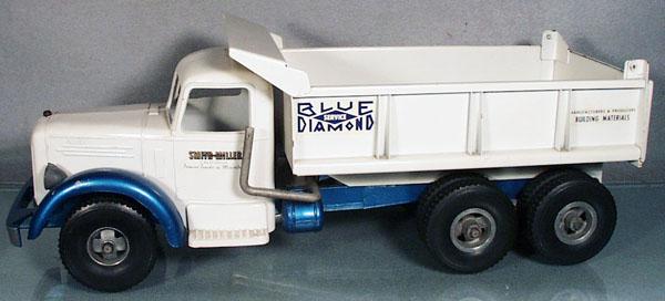 SMITH MILLER BLUE DIAMOND MACK DUMP TRUCK: die cast, black rubber tires, 19" long, minor playwear, old restoration, C7.
